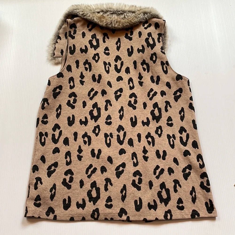 Cheetah print, tan & brown faux fur collared vest.  Girls size large + plus